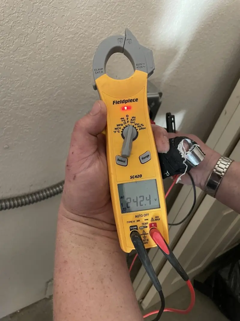 Voltage testing with clamp meter during Recessed Lighting Installation in Upper Hanover